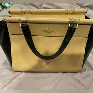 Authentic Coach Bag magnetic side closure nice gold detail at handles.